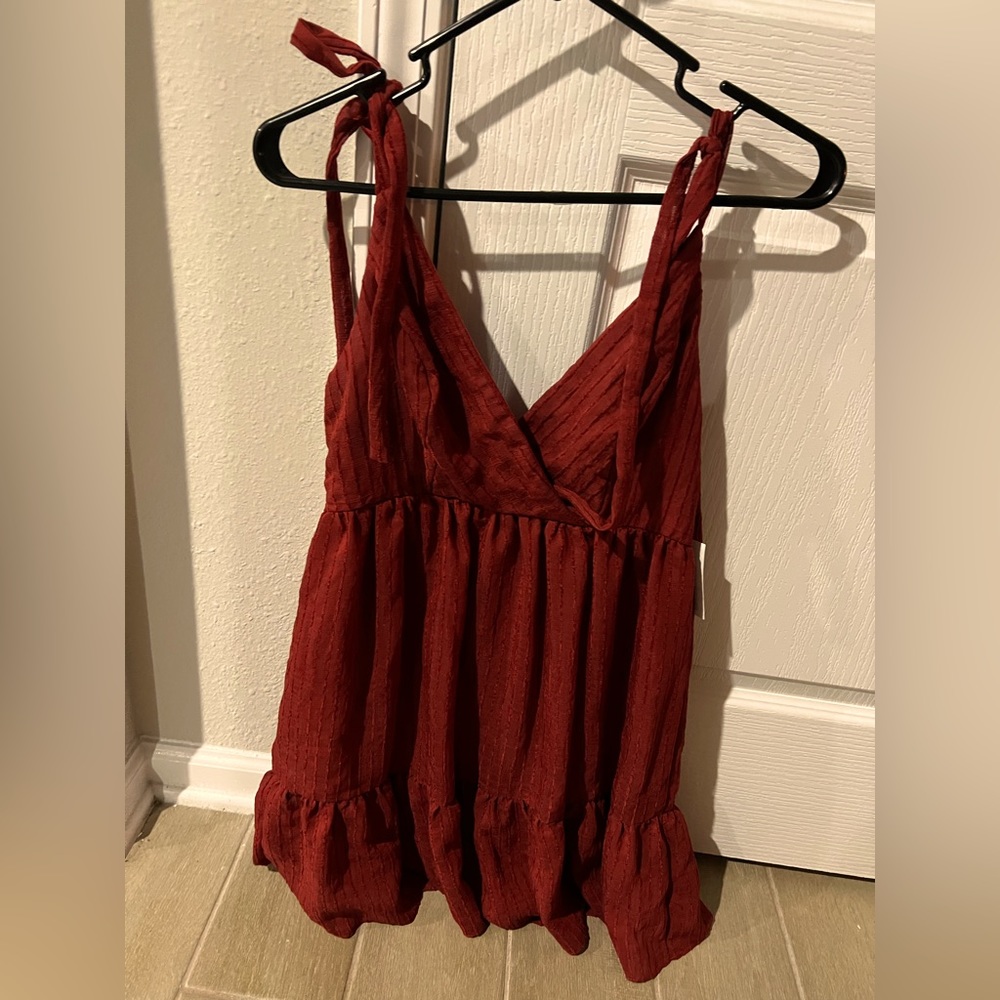 Darling burgundy classy dress size 7/8 from Dillards.  Never worn.  Smoke-free.